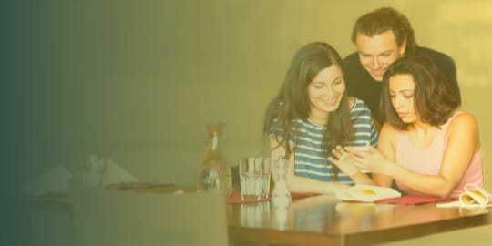 Family at restaurant sharing a School marketing Social Media Post